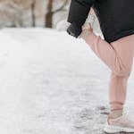 Photograph of a Person Stretching Knees